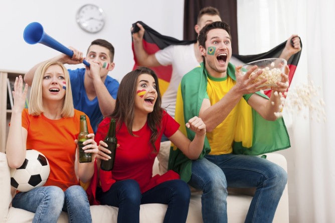 Crazy soccer fans during the football match