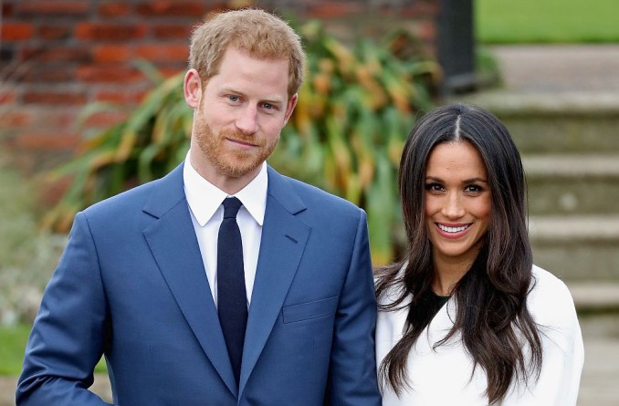LONDON, ENGLAND - NOVEMBER 27:  Prince Harry and Meghan Markle during an official photocall to announce the engagement of Prince Harry and actress Meghan Markle at The Sunken Gardens at Kensington Palace on November 27, 2017 in London, England.  Prince Harry and Meghan Markle have been a couple officially since November 2016 and are due to marry in Spring 2018.  (Photo by Chris Jackson/Getty Images)